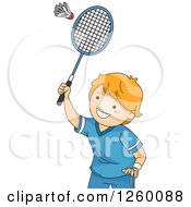 Caucasian Boy Playing Badminton
