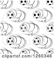 Clipart Of A Seamless Pattern Background Of Black And White Soccer Balls Royalty Free Vector Illustration