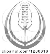 Clipart Of A Grayscale American Football Royalty Free Vector Illustration by Chromaco