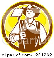 Poster, Art Print Of Retro Male Farmer Holding A Hoe In A Yellow Brown And White Circle