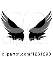 Poster, Art Print Of Black Silhouetted Feathered Wings