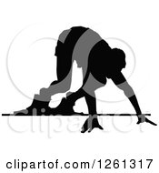 Clipart Of A Black Silhouetted Male Athlete Sprinter At The Start Line Royalty Free Vector Illustration