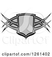 Clipart Of A Grayscale Tribal Shield Badge Royalty Free Vector Illustration