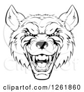 Clipart Of A Growling Black And White Aggressive Wolf Face Royalty Free Vector Illustration