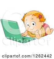 Red Haired White Toddler Girl Using A Laptop On The Floor