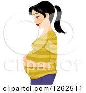Clipart Of A Happy Young Pregnant Asian Woman Looking Down And Holding Her Belly Royalty Free Vector Illustration