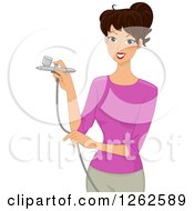 Brunette Caucasian Woman Using An Airbrush