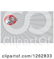 Clipart Of A Cartoon Filming Cameraman And Rays Business Card Design Royalty Free Vector Illustration