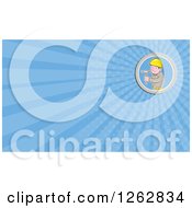 Clipart Of A Cartoon Carpenter Holding A Hammer And Rays Business Card Design Royalty Free Vector Illustration
