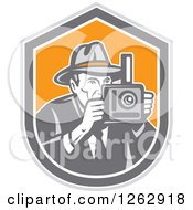 Poster, Art Print Of Retro Male Photographer In A Fedora Hat In A Gray White And Orange Shield