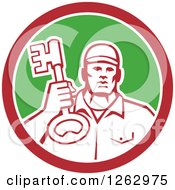 Clipart Of A Retro Male Locksmith Holding Up A Key In A Red White And Green Circle Royalty Free Vector Illustration