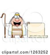 Clipart Of A Cartoon Chubby Male Shepherd Holding A Scroll Royalty Free Vector Illustration