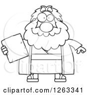 Black And White Cartoon Happy Chubby Moses Holding A Tablet