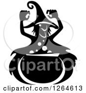 Clipart Of A Black And White Witch Over A Cauldron Royalty Free Vector Illustration