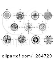 Clipart Of Black And White Compass Rose Designs Royalty Free Vector Illustration