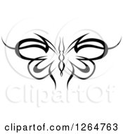 Clipart Of A Black And White Tribal Butterfly Royalty Free Vector Illustration