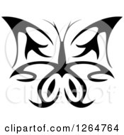 Clipart Of A Black And White Tribal Butterfly Royalty Free Vector Illustration