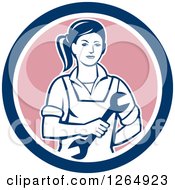 Clipart Of A Retro Female Mechanic Holding A Wrench In A Blue White And Pink Circle Royalty Free Vector Illustration