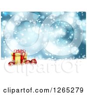 Poster, Art Print Of Christmas Background Of 3d Baubles With A Gift Over Blue Bokeh Flares And Snowflakes