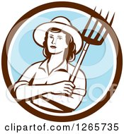 Retro Female Farmer Holding A Pitchfork In A Brown White And Blue Circle