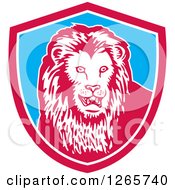 Clipart Of A Retro Lion In A Pink White And Blue Shield Royalty Free Vector Illustration