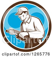 Poster, Art Print Of Retro Male Home Insulation Worker Holding A Hose In A Brown White And Blue Circle