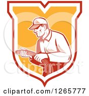 Clipart Of A Retro Male Home Insulation Worker Holding A Hose In A Shield Royalty Free Vector Illustration