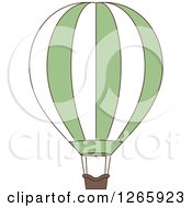 Clipart Of A Green And White Hot Air Balloon Royalty Free Vector Illustration