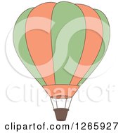 Clipart Of A Green And Orange Hot Air Balloon Royalty Free Vector Illustration
