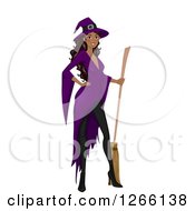 Black Witch Woman Posing With A Broom