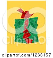 Clipart Of A Green And Red Geometric Christmas Gift On Yellow Royalty Free Vector Illustration