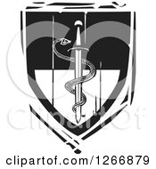 Poster, Art Print Of Black And White Woodcut Heraldic Medical Sword With An Entwined Snake Shield