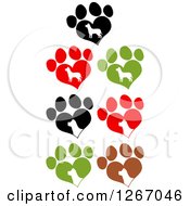 Poster, Art Print Of White Silhouetted Dogs In Heart Shaped Paw Prints