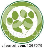 Clipart Of A Green And White Circle Of A Silhouetted Dog Head In A Heart Shaped Paw Print Royalty Free Vector Illustration