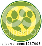 Poster, Art Print Of Green And Yellow Circle Of A Silhouetted Dog Head In A Heart Shaped Paw Print