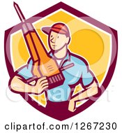 Poster, Art Print Of Cartoon White Male Construction Worker Holding A Jackhammer In A Maroon White And Yellow Shield