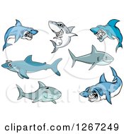 Clipart Of Happy And Vicious Sharks Royalty Free Vector Illustration