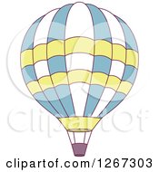 Clipart Of A Blue White And Green Hot Air Balloon Royalty Free Vector Illustration