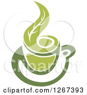 Clipart Of A Two Toned Hot Green Tea Cup And Steam Leaf Royalty Free Vector Illustration