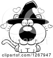 Clipart Of A Black And White Loving Halloween Witch Cat With Hearts Royalty Free Vector Illustration