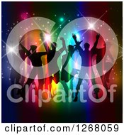 Poster, Art Print Of Silhouetted Group Of People Dancing And Jumping Over Colorful Lights And Flares