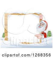 Poster, Art Print Of Santa Clause Pointing Around A Blank Wooden Christmas Sign In The Snow