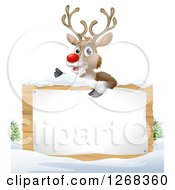Poster, Art Print Of Rudolph Red Nosed Reindeer Over A Wood Sign In The Snow On White