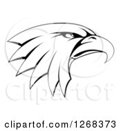 Clipart Of A Black And White Bald Eagle Head In Profile Royalty Free Vector Illustration