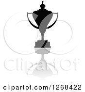 Clipart Of A Black Silhouetted Trophy Or Urn And Reflection 7 Royalty Free Vector Illustration