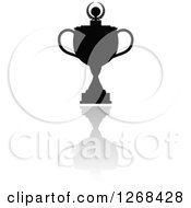Clipart Of A Black Silhouetted Trophy Or Urn And Reflection 2 Royalty Free Vector Illustration