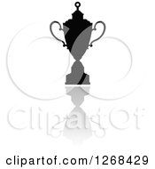 Clipart Of A Black Silhouetted Trophy Or Urn And Reflection 3 Royalty Free Vector Illustration