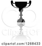 Clipart Of A Black Silhouetted Urn Or Trophy Cup And Reflection 3 Royalty Free Vector Illustration