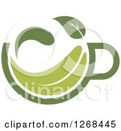 Clipart Of A Steamy Green Tea Cup And Leaf 3 Royalty Free Vector Illustration