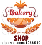 Clipart Of A Croissant With Wheat Text And A Crown Royalty Free Vector Illustration